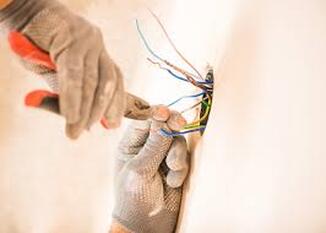 Electrician repairing wires